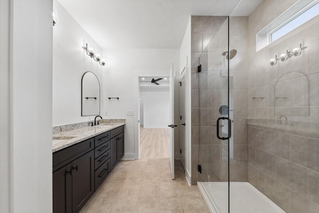 338 Dugout Rd, Summertown, TN 38483 - full bath featuring double vanity, a shower stall, and baseboards