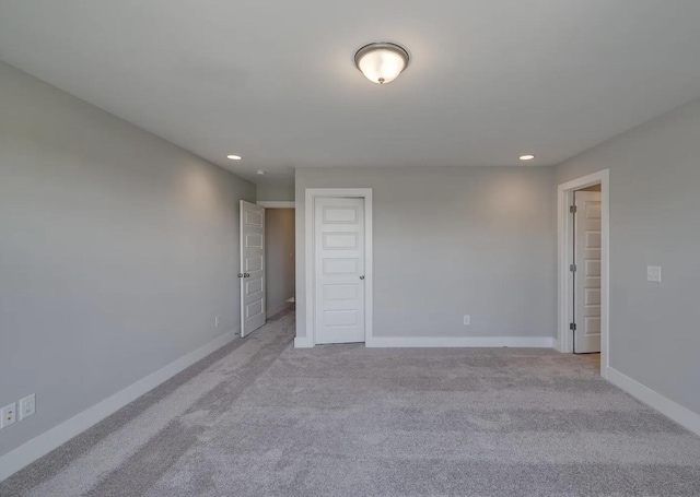 135 Grandstand Blvd, Gallatin, TN 37066 - carpeted empty room with recessed lighting and baseboards