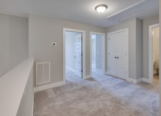 135 Grandstand Blvd, Gallatin, TN 37066 - unfurnished room featuring attic access, carpet floors, and baseboards