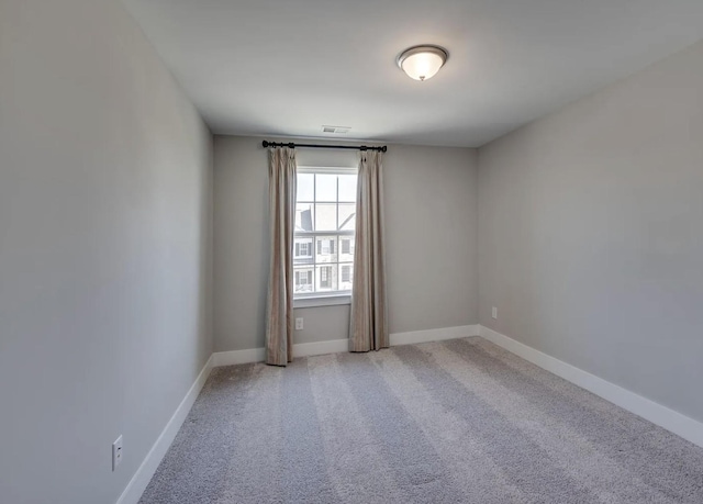 135 Grandstand Blvd, Gallatin, TN 37066 - spare room featuring baseboards and carpet floors