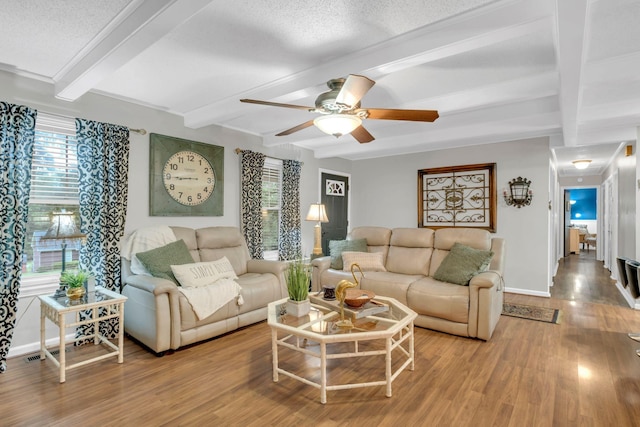 130 Shane Lee Cir, Dover, TN 37058 - living room with beamed ceiling, wood finished floors, a ceiling fan, and baseboards