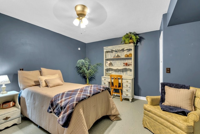 130 Shane Lee Cir, Dover, TN 37058 - bedroom with ceiling fan, concrete flooring, and baseboards
