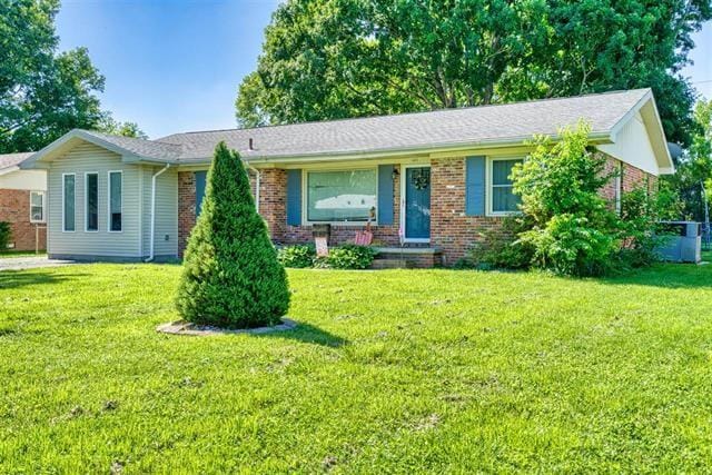 413 Colonial Ter, Hopkinsville, KY 42240 - ranch-style house with brick siding and a front lawn