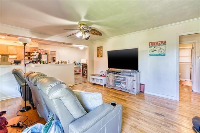 413 Colonial Ter, Hopkinsville, KY 42240 - living room featuring a ceiling fan, ornamental molding, wood finished floors, and baseboards