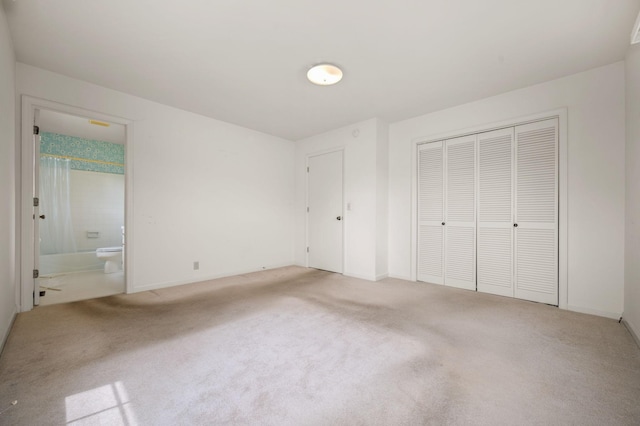 2715 Clearview Ct, Murfreesboro, TN 37129 - unfurnished bedroom with carpet, a closet, ensuite bathroom, and baseboards