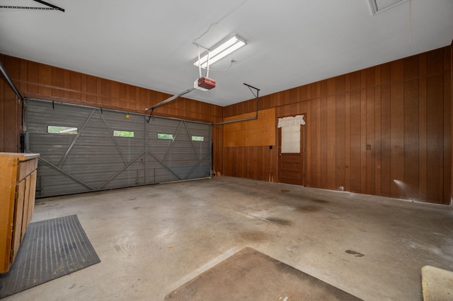 2715 Clearview Ct, Murfreesboro, TN 37129 - garage with a garage door opener and wood walls