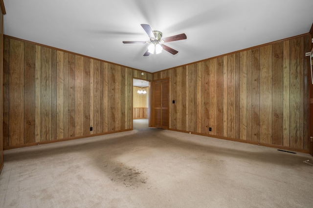 2715 Clearview Ct, Murfreesboro, TN 37129 - empty room with a ceiling fan, wood walls, carpet, and baseboards
