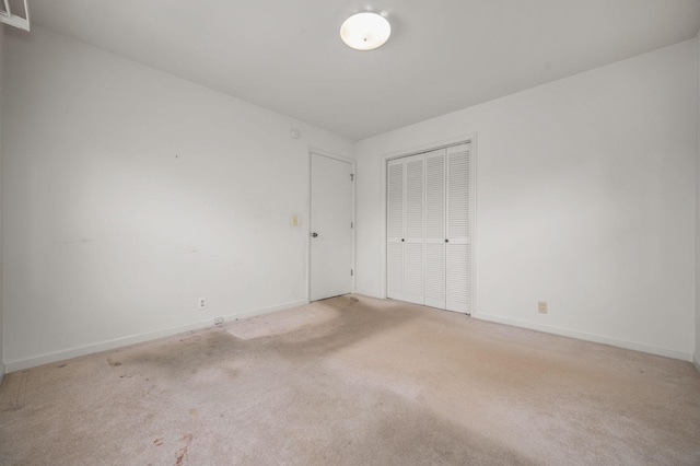 2715 Clearview Ct, Murfreesboro, TN 37129 - unfurnished bedroom featuring light colored carpet, a closet, and baseboards