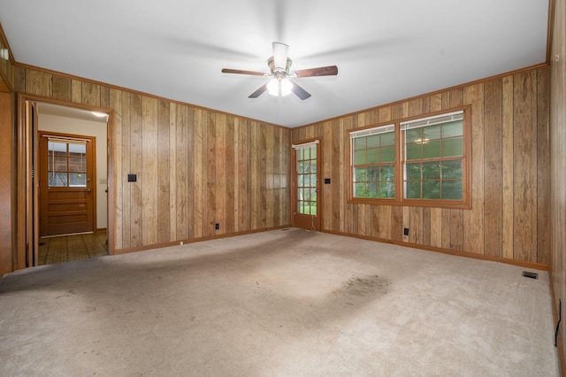 2715 Clearview Ct, Murfreesboro, TN 37129 - empty room with wooden walls, ceiling fan, baseboards, and carpet floors