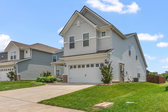 129 Southwind Run, Spring Hill, TN 37174 - view of front of property featuring board and batten siding, an attached garage, and concrete driveway