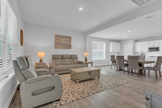 129 Southwind Run, Spring Hill, TN 37174 - living area featuring light wood-style floors and recessed lighting