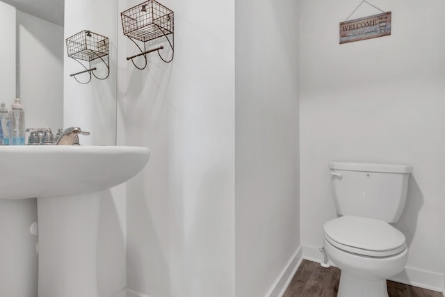 129 Southwind Run, Spring Hill, TN 37174 - half bathroom featuring wood finished floors and toilet