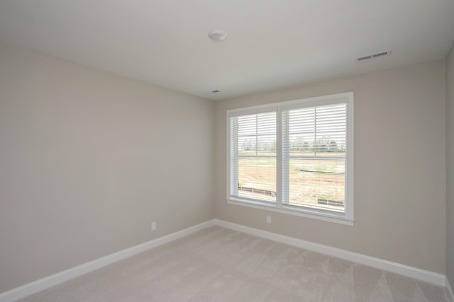 5956 Hunt Valley Dr, Spring Hill, TN 37174 - spare room with baseboards and light carpet