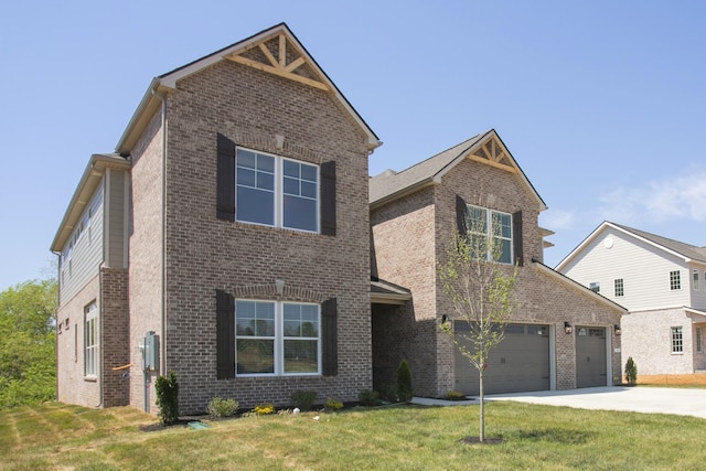 5956 Hunt Valley Dr, Spring Hill, TN 37174 - traditional-style house with brick siding, concrete driveway, a front lawn, and a garage