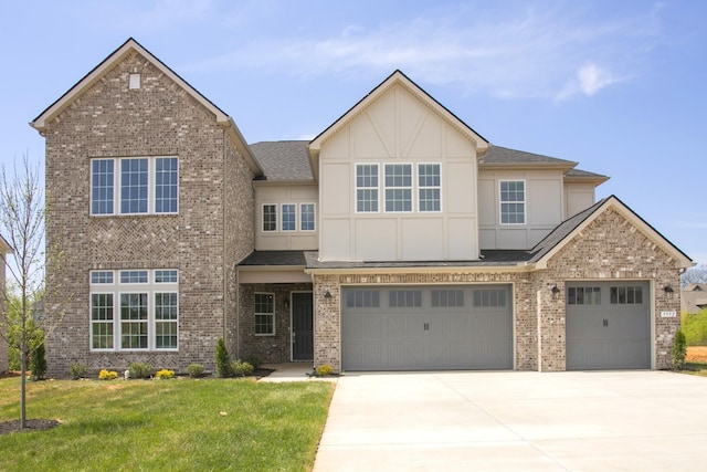 5952 Hunt Valley Dr, Spring Hill, TN 37174 - view of front of property featuring driveway, a front yard, roof with shingles, and brick siding