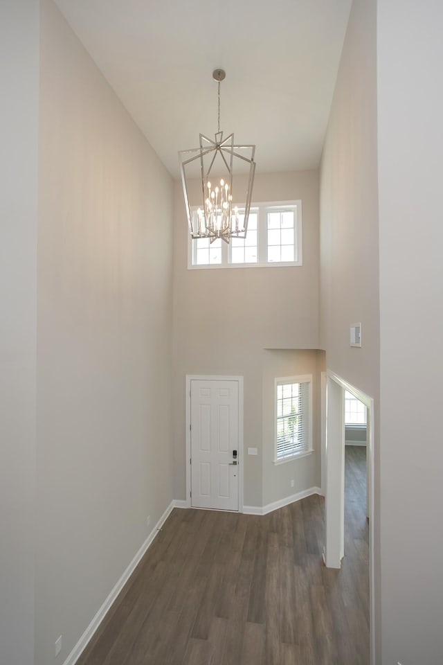 5952 Hunt Valley Dr, Spring Hill, TN 37174 - foyer with a high ceiling, a chandelier, wood finished floors, and baseboards