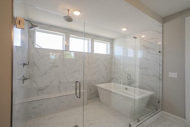 5952 Hunt Valley Dr, Spring Hill, TN 37174 - bathroom featuring marble finish floors, a freestanding tub, a marble finish shower, baseboards, and recessed lighting