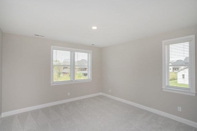 5952 Hunt Valley Dr, Spring Hill, TN 37174 - spare room featuring light colored carpet, plenty of natural light, baseboards, and recessed lighting