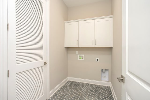 5952 Hunt Valley Dr, Spring Hill, TN 37174 - washroom featuring hookup for an electric dryer, washer hookup, baseboards, and cabinet space
