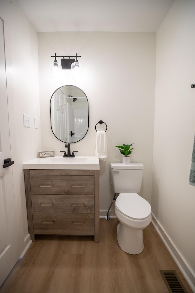 1320 Napier Lake Rd, Hohenwald, TN 38462 - bathroom featuring wood finished floors, vanity, and baseboards