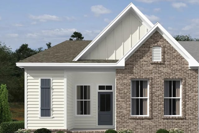 130 Sidlaw Pass, Smyrna, TN 37167 - rear view of house with board and batten siding, roof with shingles, and brick siding