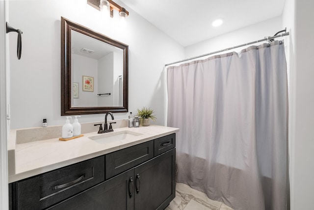 1415 Southside Rd, Southside, TN 37171 - bathroom with marble finish floors, vanity, and a shower with shower curtain