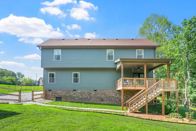 1415 Southside Rd, Southside, TN 37171 - rear view of property with a ceiling fan, stairs, a gate, and crawl space