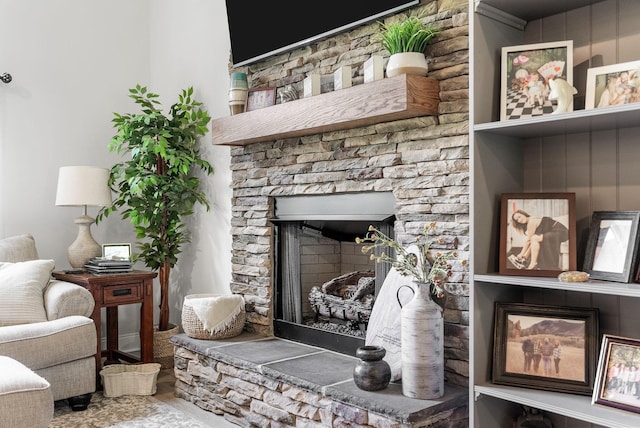 1415 Southside Rd, Southside, TN 37171 - living area with wood finished floors and a stone fireplace