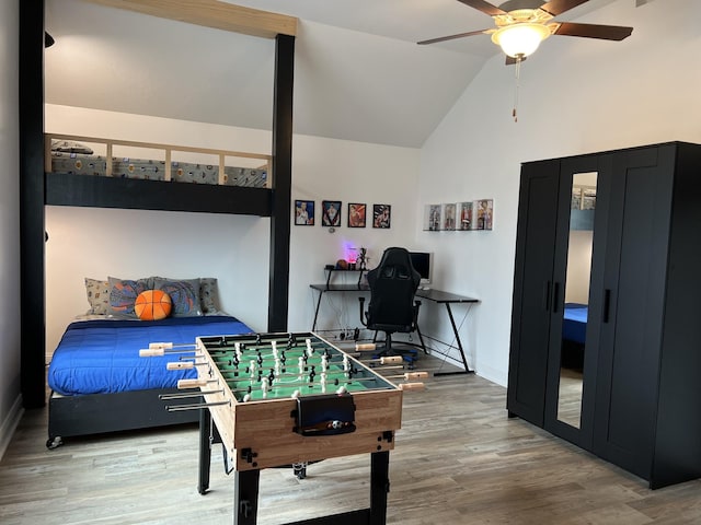 219 Dugger Dr, Clarksville, TN 37042 - playroom featuring vaulted ceiling, a ceiling fan, wood finished floors, and an office area