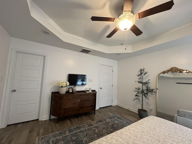 219 Dugger Dr, Clarksville, TN 37042 - bedroom with a raised ceiling, wood finished floors, baseboards, and a ceiling fan