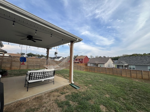 219 Dugger Dr, Clarksville, TN 37042 - view of yard with ceiling fan, a patio, and a residential view