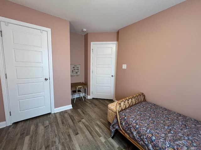 219 Dugger Dr, Clarksville, TN 37042 - bedroom with wood finished floors and baseboards