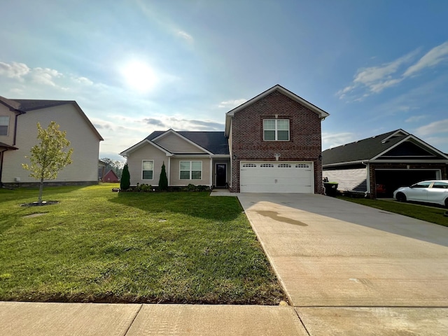 219 Dugger Dr, Clarksville, TN 37042 - view of front of house with brick siding, concrete driveway, an attached garage, and a front lawn