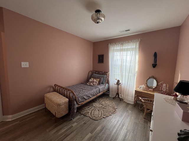 219 Dugger Dr, Clarksville, TN 37042 - bedroom with wood finished floors and baseboards
