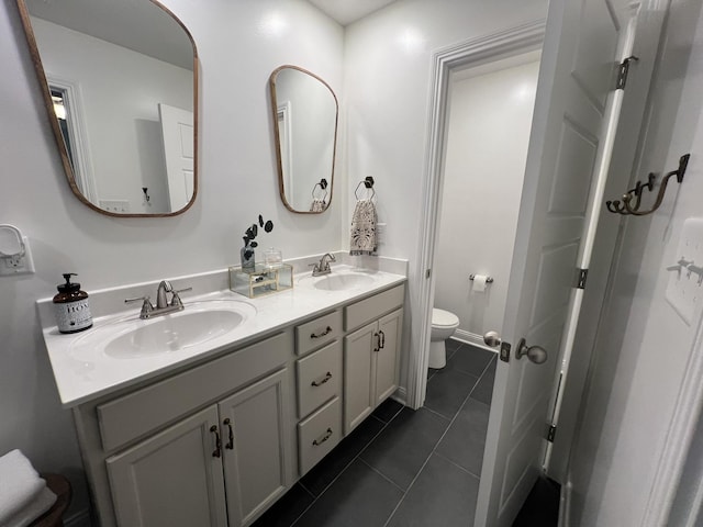 219 Dugger Dr, Clarksville, TN 37042 - bathroom with toilet, tile patterned floors, and double vanity