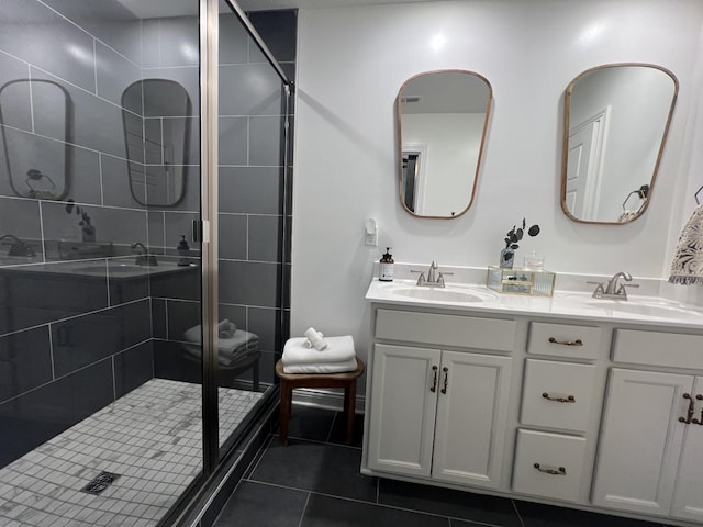 219 Dugger Dr, Clarksville, TN 37042 - full bathroom with tile patterned flooring, a shower stall, and double vanity