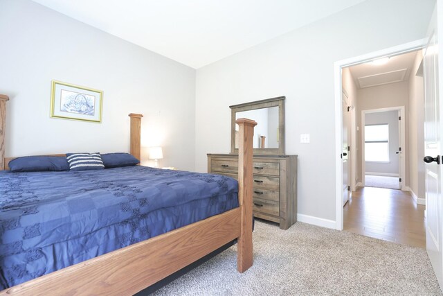110 Saw Mill Rd, Dickson, TN 37055 - carpeted bedroom featuring baseboards and attic access