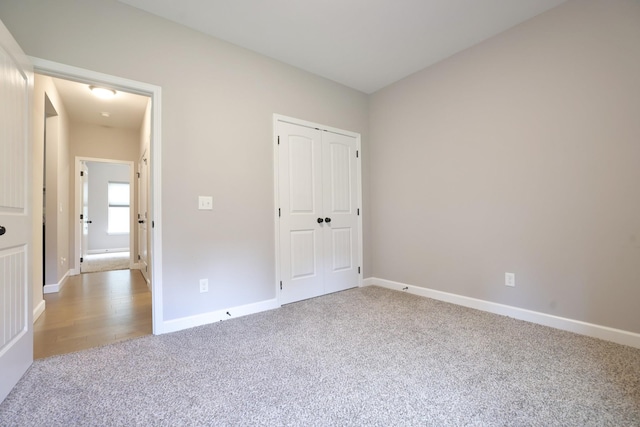 110 Saw Mill Rd, Dickson, TN 37055 - unfurnished bedroom featuring carpet, baseboards, and a closet