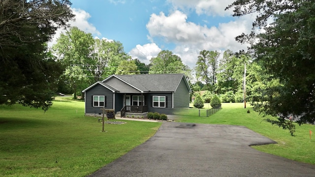 110 Saw Mill Rd, Dickson, TN 37055 - view of front of property featuring a porch, a front lawn, and asphalt driveway