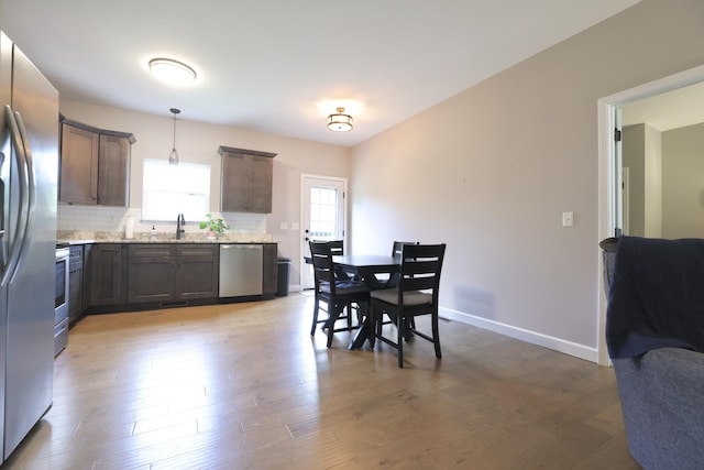 110 Saw Mill Rd, Dickson, TN 37055 - dining area with light wood-type flooring and baseboards