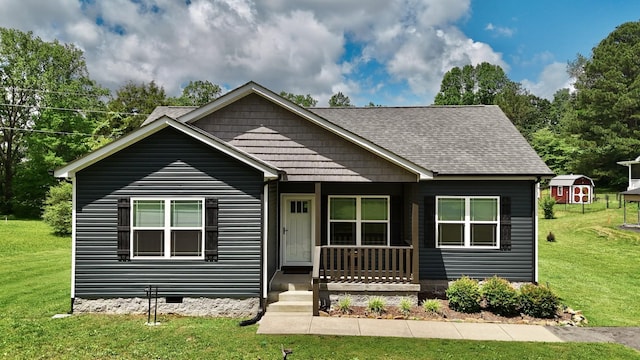 110 Saw Mill Rd, Dickson, TN 37055 - bungalow-style home with a front yard, a shingled roof, and covered porch
