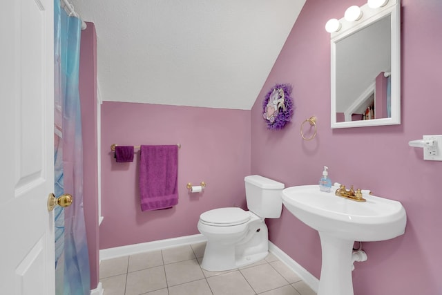 891 Deepwoods Rd, Sewanee, TN 37375 - full bathroom with vaulted ceiling, baseboards, toilet, tile patterned flooring, and a shower with shower curtain