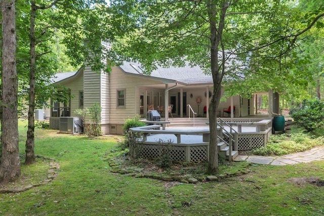891 Deepwoods Rd, Sewanee, TN 37375 - back of property with a wooden deck, crawl space, a lawn, and central AC unit