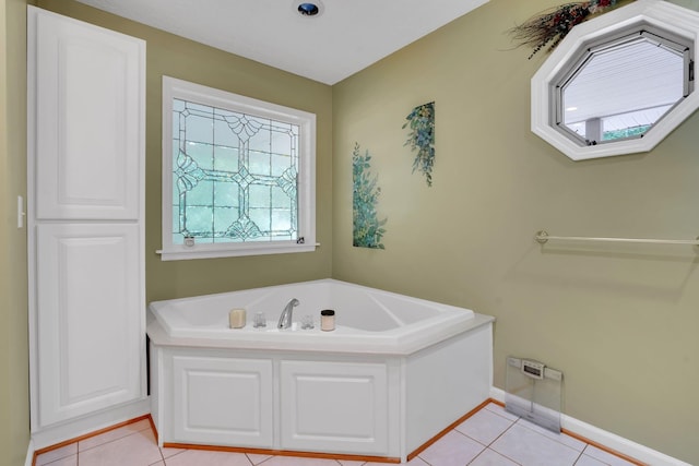 891 Deepwoods Rd, Sewanee, TN 37375 - bathroom with plenty of natural light, tile patterned flooring, and a bath