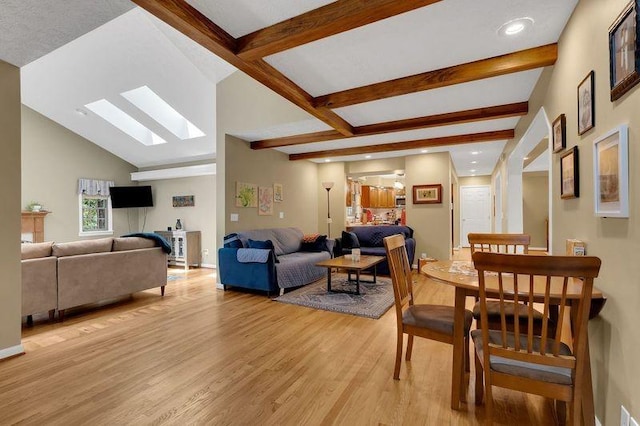 891 Deepwoods Rd, Sewanee, TN 37375 - living area with a skylight, beam ceiling, light wood-style flooring, baseboards, and recessed lighting