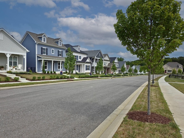 7131 Frances St, Fairview, TN 37062 - view of asphalt street with sidewalks, a residential view, and curbs
