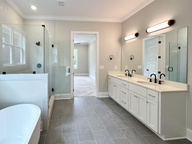 7131 Frances St, Fairview, TN 37062 - bathroom with a freestanding tub, crown molding, double vanity, a stall shower, and tile patterned floors