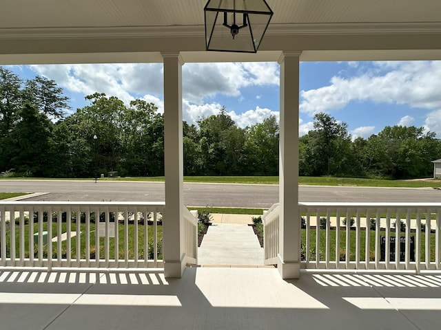 7131 Frances St, Fairview, TN 37062 - covered porch with view of scattered trees