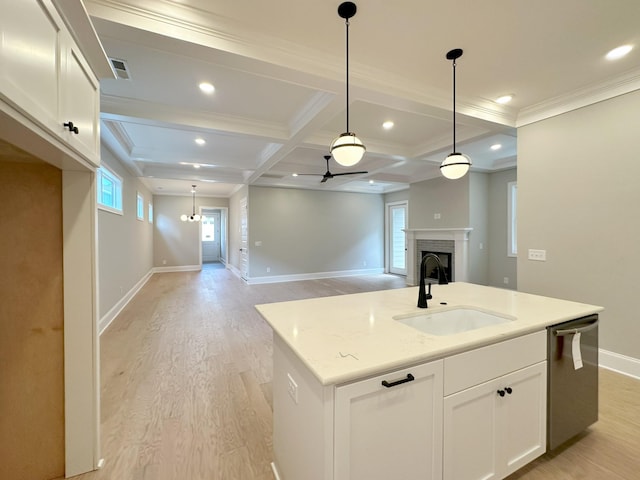 7131 Frances St, Fairview, TN 37062 - kitchen featuring light wood-style floors, recessed lighting, white cabinets, an island with sink, and pendant lighting