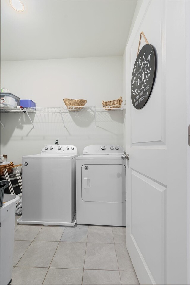 2932 Hen Brook Dr, Columbia, TN 38401 - washroom featuring independent washer and dryer and light tile patterned floors